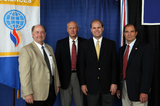 From left: USA Senior Vice President for Academic Affairs Dr. David Johnson; USA Center for Forensics, Information Technology and Security Director Les Barnett; Frazier Payne, field representative for U.S. Rep. Jo Bonner; and USA School of Computer and Information Sciences Dean Dr. Alec Yasinsac. 